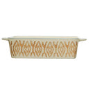 A hand-stamped stoneware baker with geometric patterns.