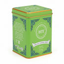 A green tin of Harney & Sons Organic Supreme Green tea with decorative patterns and product information on the label.