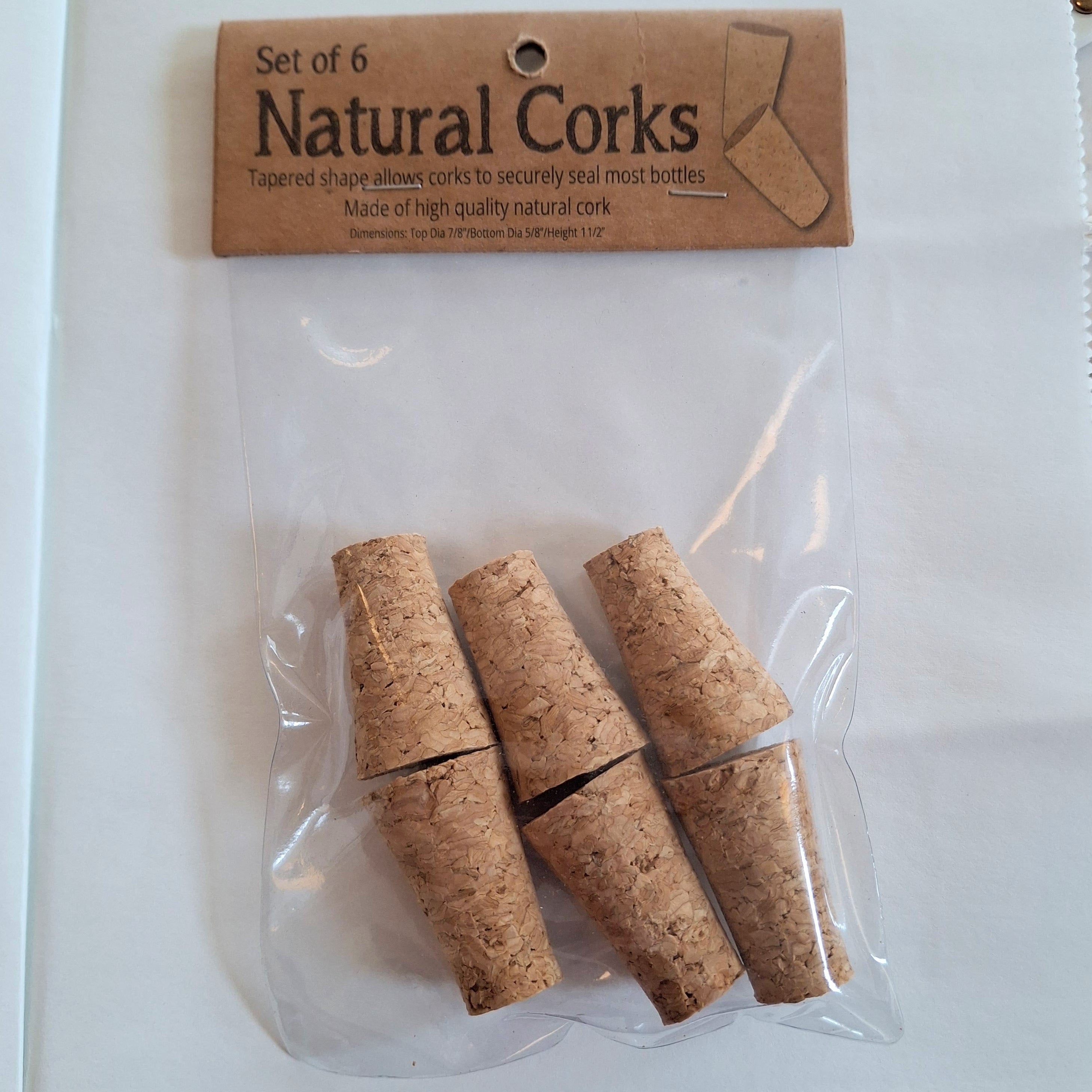 Set of 6 natural corks in clear packaging with a label on a white background