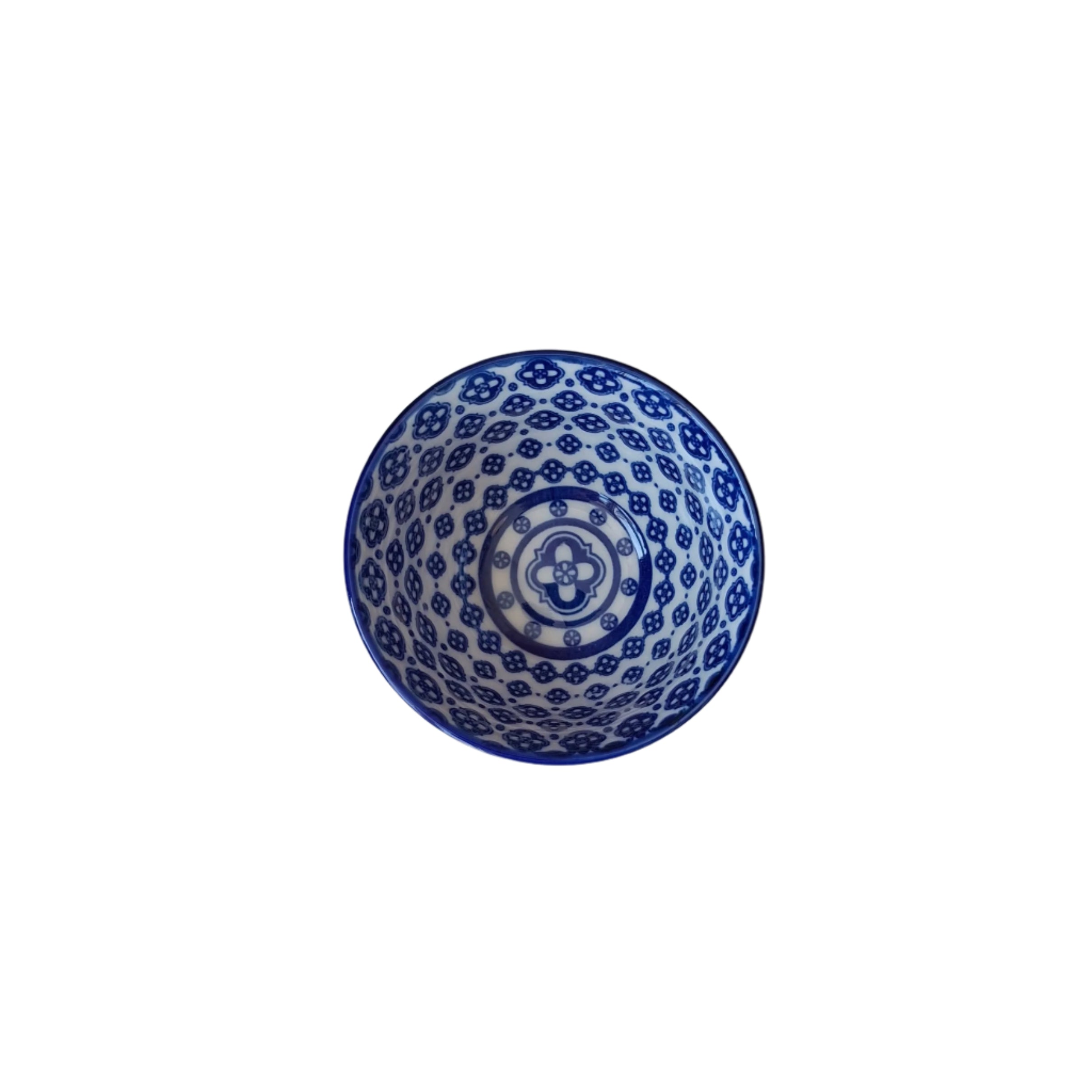 Blue and white patterned bowl on a white background