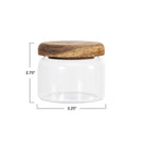 Clear glass jar with a wooden lid and dimensions on a white background