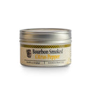 Tin of bourbon smoked citrus pepper on a white background