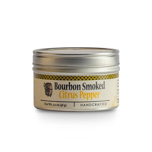 Tin of bourbon smoked citrus pepper on a white background