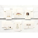 Set of greeting cards with cake illustrations on a white wooden surface