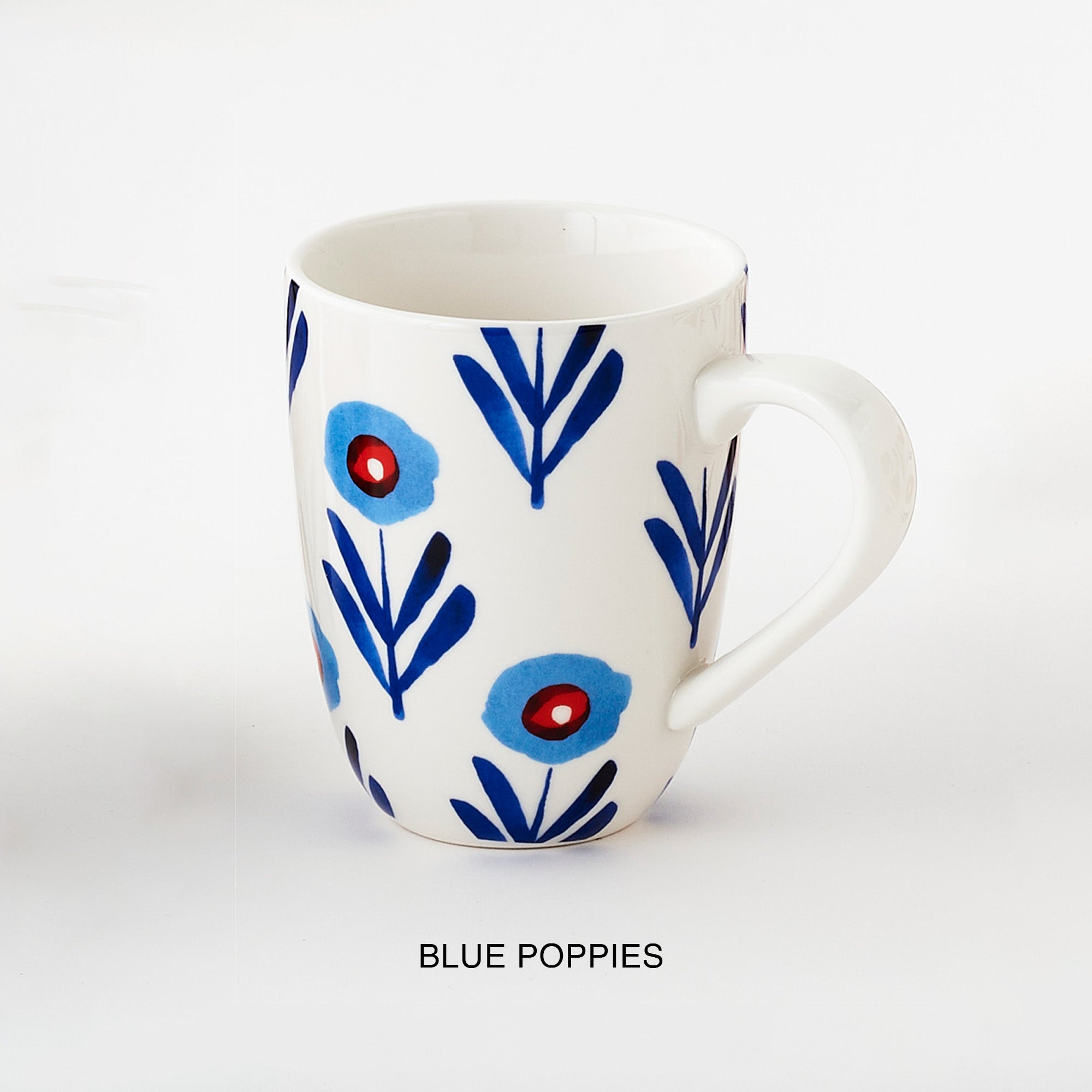 A ceramic mug with blue floral pattern and 'blue poppies' description underneath.