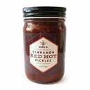 Jar of King Bee Cinnamon Red Hot Pickles on a light background