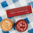 Hammond's PB&J Sandwich chocolate bar with peanut butter and jelly on a checkered background