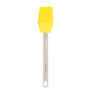 A mini basting brush with a stainless steel handle and yellow silicone bristles on a white background.