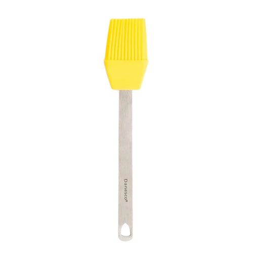 A mini basting brush with a stainless steel handle and yellow silicone bristles on a white background.