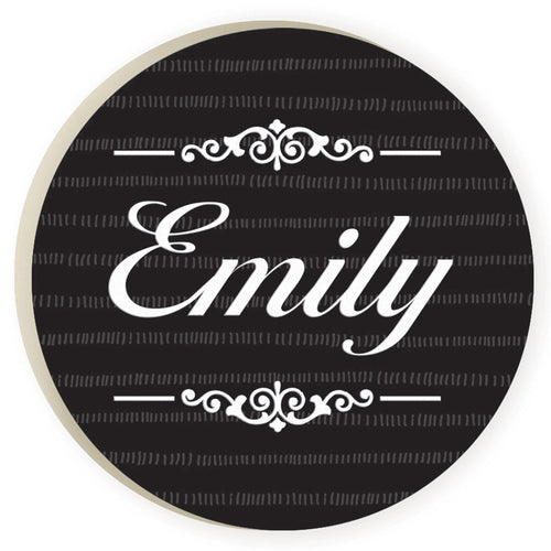A car coaster with a customized name and decoration