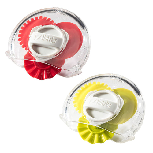 Two pastry trimmers with adjustable cutting edges, one in red and one in yellow, each with a white dial for selecting the edge.