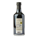 Bottle of balsamic vinegar with label on a white background