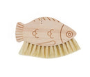 Fish-shaped wooden brush with bristles on a white background