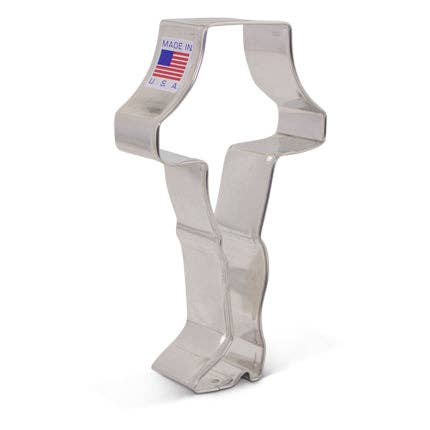 Metallic cookie cutter shaped like the leg lamp from A Christmas Story with a 'Made in USA' label on a white background