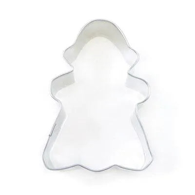 Cookie cutter shaped like a gingerbread girl on a white background