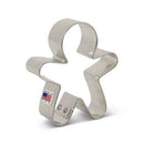 Metallic cookie cutter shaped like a gingerbread man with a 'Made in USA' label on a white background