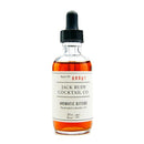 A bottle of Jack Rudy Aromatic Bitters with a dropper cap, labeled for use in cocktails.