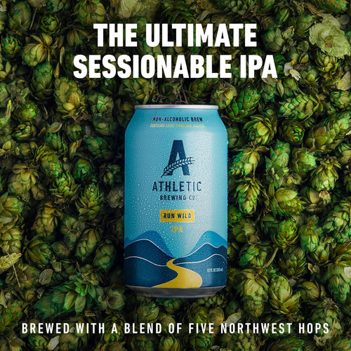 Athletic Brewing Co. non-alcoholic IPA can surrounded by hops with promotional text.