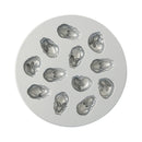 Circular metal mold with multiple baby bunny-shaped cavities on a white background