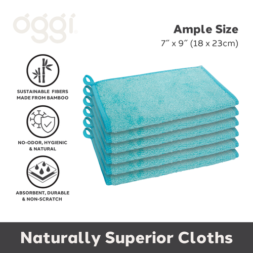 Stack of blue cloths with sustainability and size details on a white background