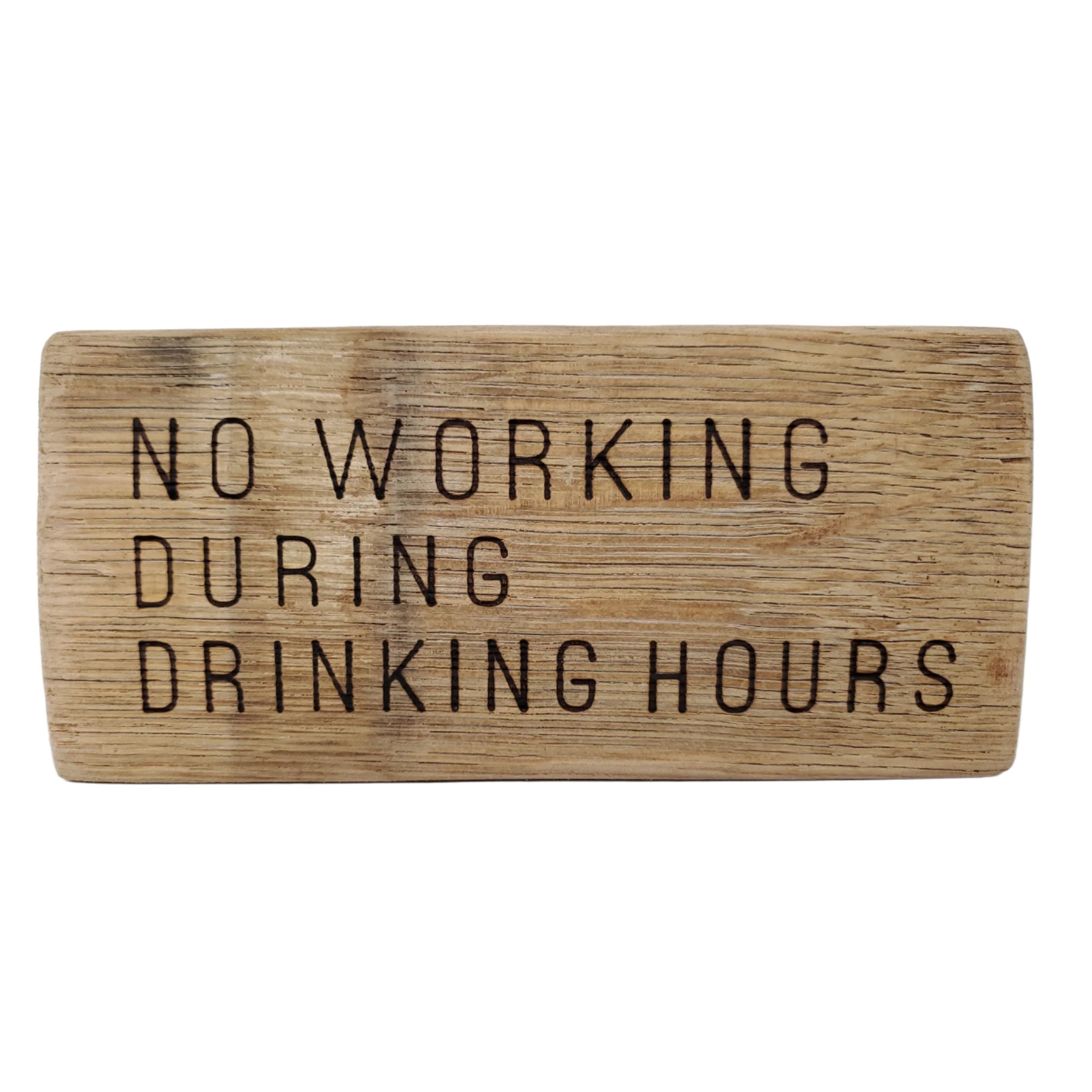 Wooden sign with text 'NO WORKING DURING DRINKING HOURS' on a white background
