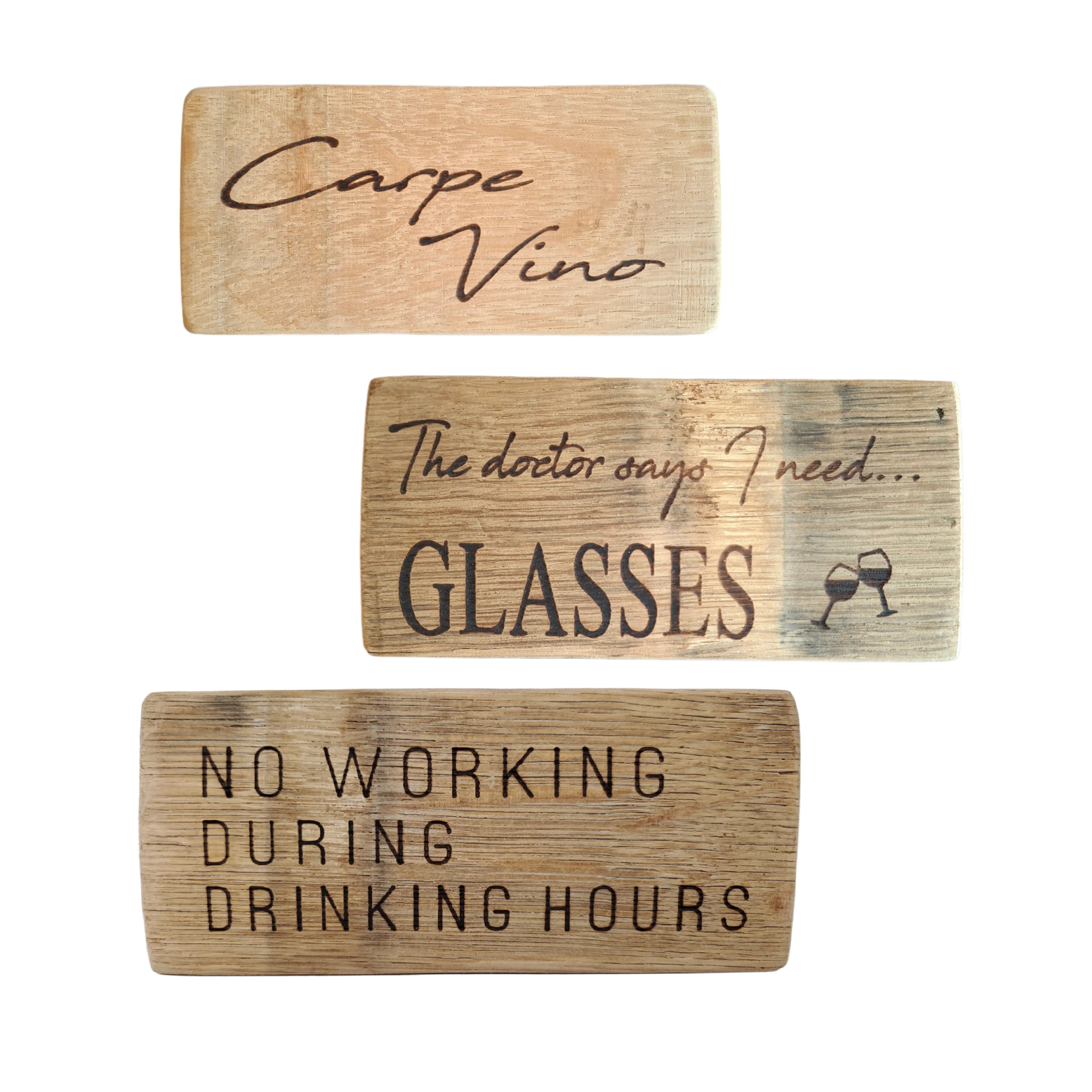 Three wooden signs with humorous sayings on a white background
