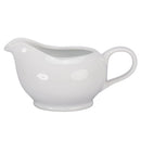 White ceramic gravy boat on a white background
