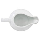 White ceramic gravy boat on a white background
