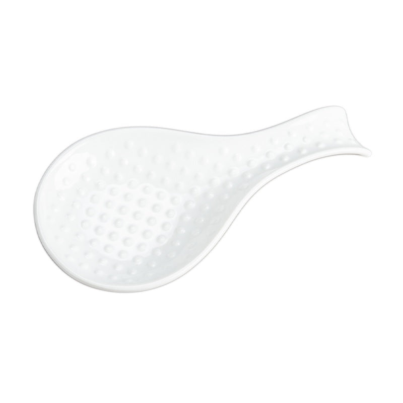 A white porcelain spoonrest with a hobnail design.