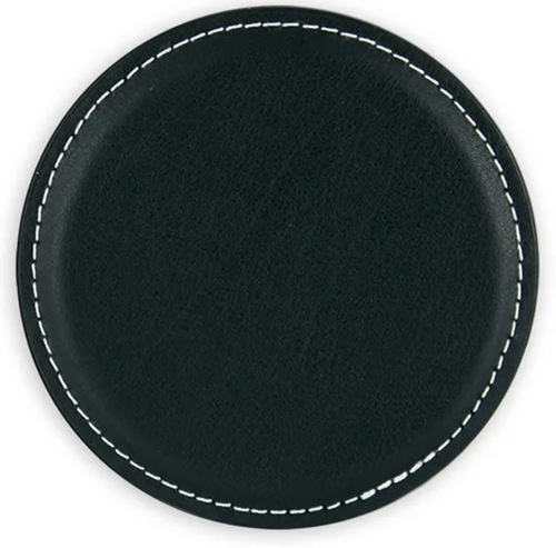 Black circular coaster with white stitching on a white background