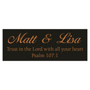 Decorative nameplate with 'Matt & Lisa' and a religious quote on a black background