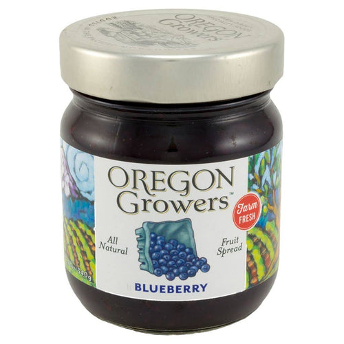 Jar of Oregon Growers blueberry fruit spread with a colorful label on a white background