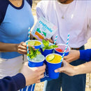 People holding blue cups with drinks and straws, with a 'craftmix' product in the background.