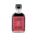 Bottle of Bourbon Smoked Bluegrass Soy Sauce on a white background