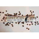 Shiver Stick popsicle packaging with coffee beans on a light background