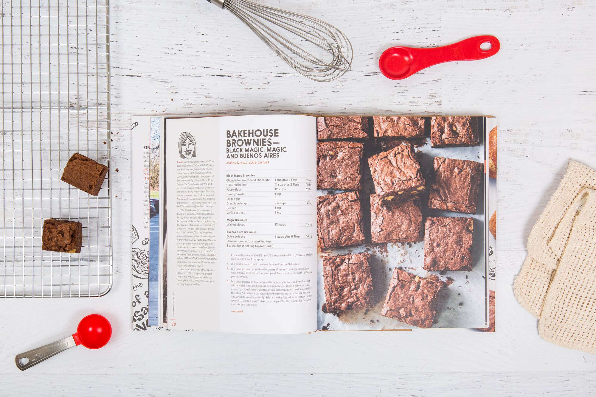 The Zingerman's Bakehouse cookbook open to a page featuring a brownie recipe and an image of browines.