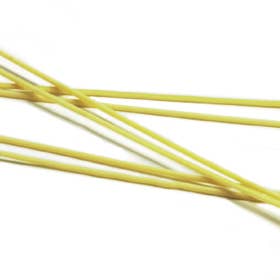 Yellow pasta on a white background