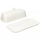 White ceramic butter dish with lid on a white background