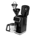 Black coffee maker with open compartments on a white background