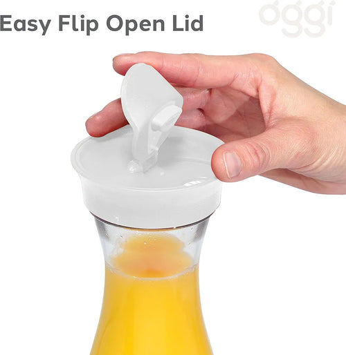 Hand opening an Easy Flip Open Lid on a bottle of orange juice with 'dgi' branding.