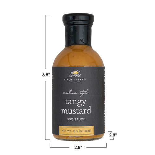 Bottle of Finch + Fennel Carolina-style tangy mustard BBQ sauce with measurements on a white background