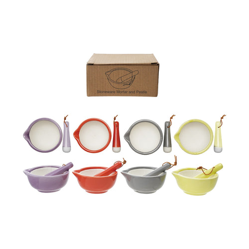 Sets of ceramic mortars and pestles in assorted colors including gray, orange, purple, and yellow, displayed alongside a cardboard box packaging.