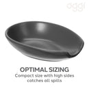 Black spoon rest on a white background, featuring the brand 'oggi'.