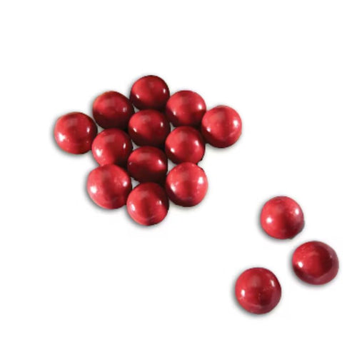 Red chocolate cheery balls on a white background