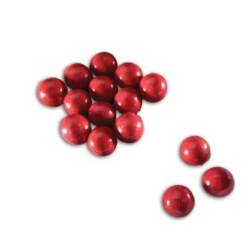 Red chocolate cheery balls on a white background