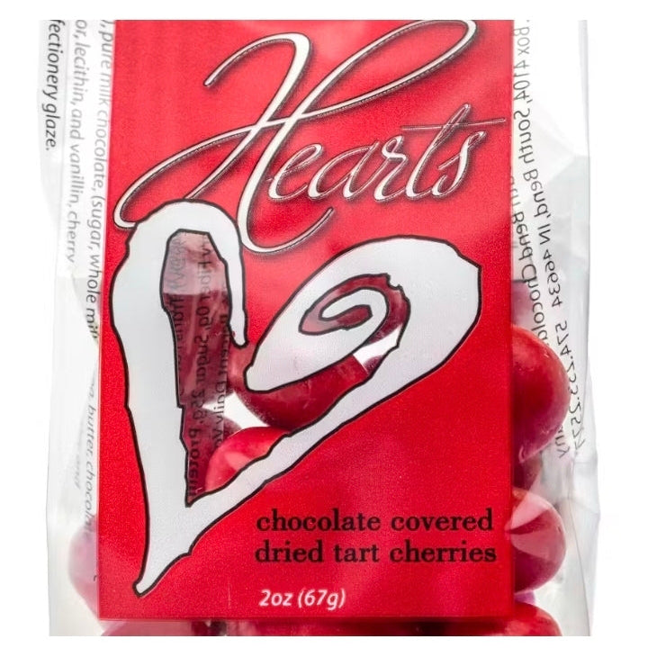 Packaging of chocolate-covered dried tart cherries with a red background and white text.