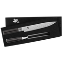 A knife and fork in a black box with a brand logo on a white background