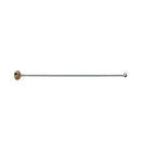 Metal cocktail stirrer with a gold cap on a white background