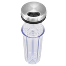A clear plastic spice shaker with five compartments, a brushed stainless steel lid, and a black collar, shown on a solid white background.