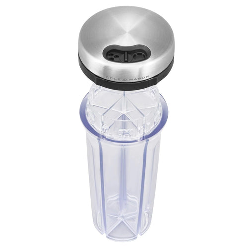 A clear plastic spice shaker with five compartments, a brushed stainless steel lid, and a black collar, shown on a solid white background.